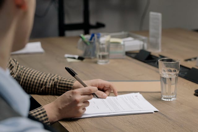 a person signing a document